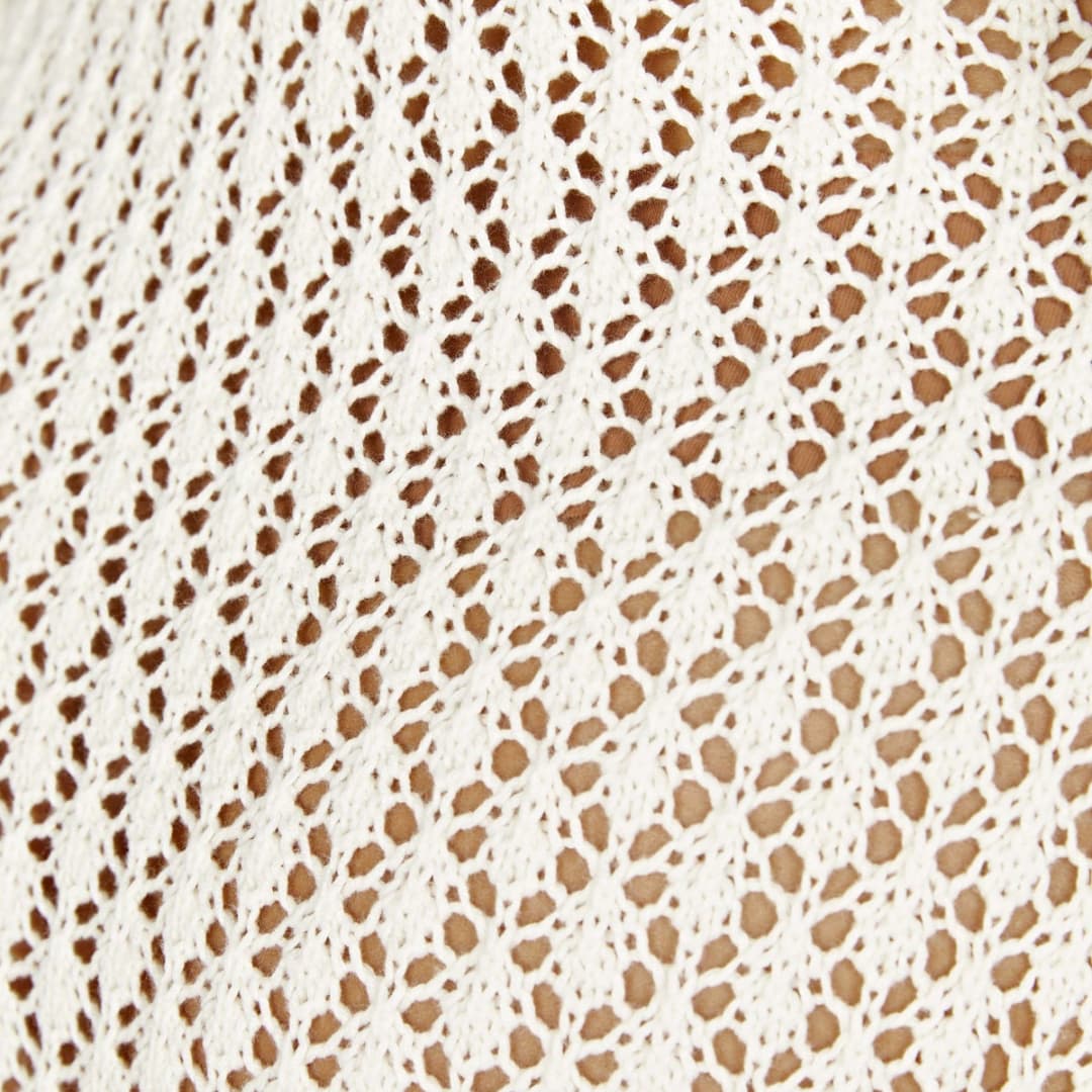 Women’s summer beach dress with crochet knit and long sleeves