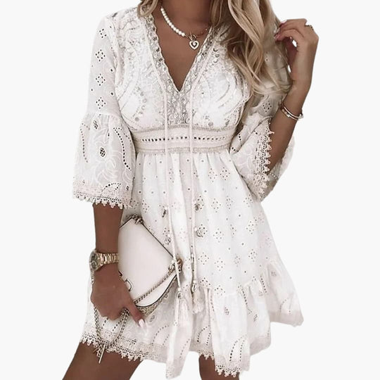 Women’s summer dress with eyelet embroidery and flared sleeves