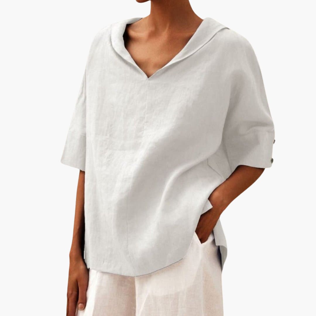 Women’s short sleeve blouse with V-neck and side slits