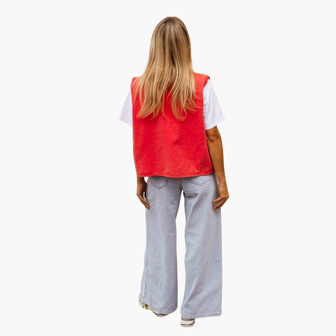 Women’s sleeveless vest with button front and vintage-washed finish