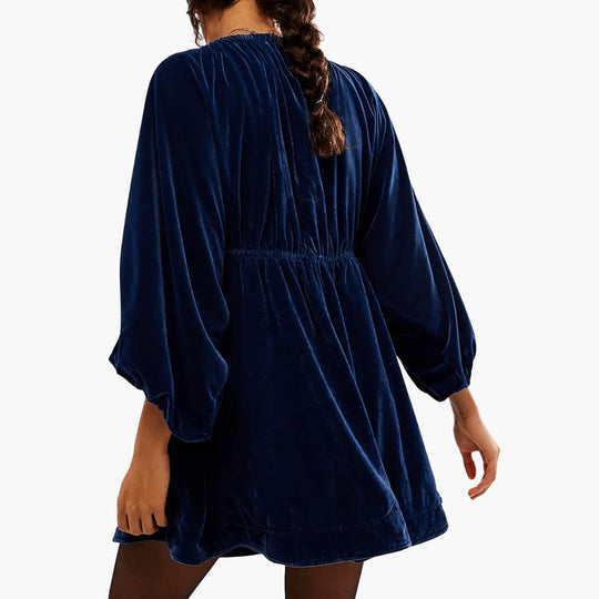 Women’s velvet mini dress with long sleeves and V-neckline