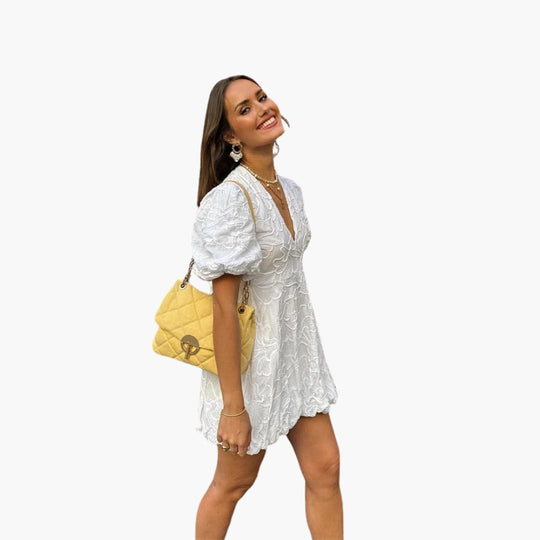 Women’s summer mini dress with puff sleeves and round neckline