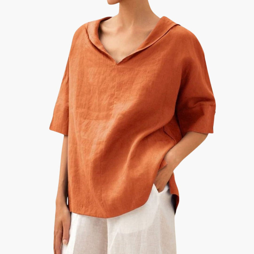 Women’s short sleeve blouse with V-neck and side slits
