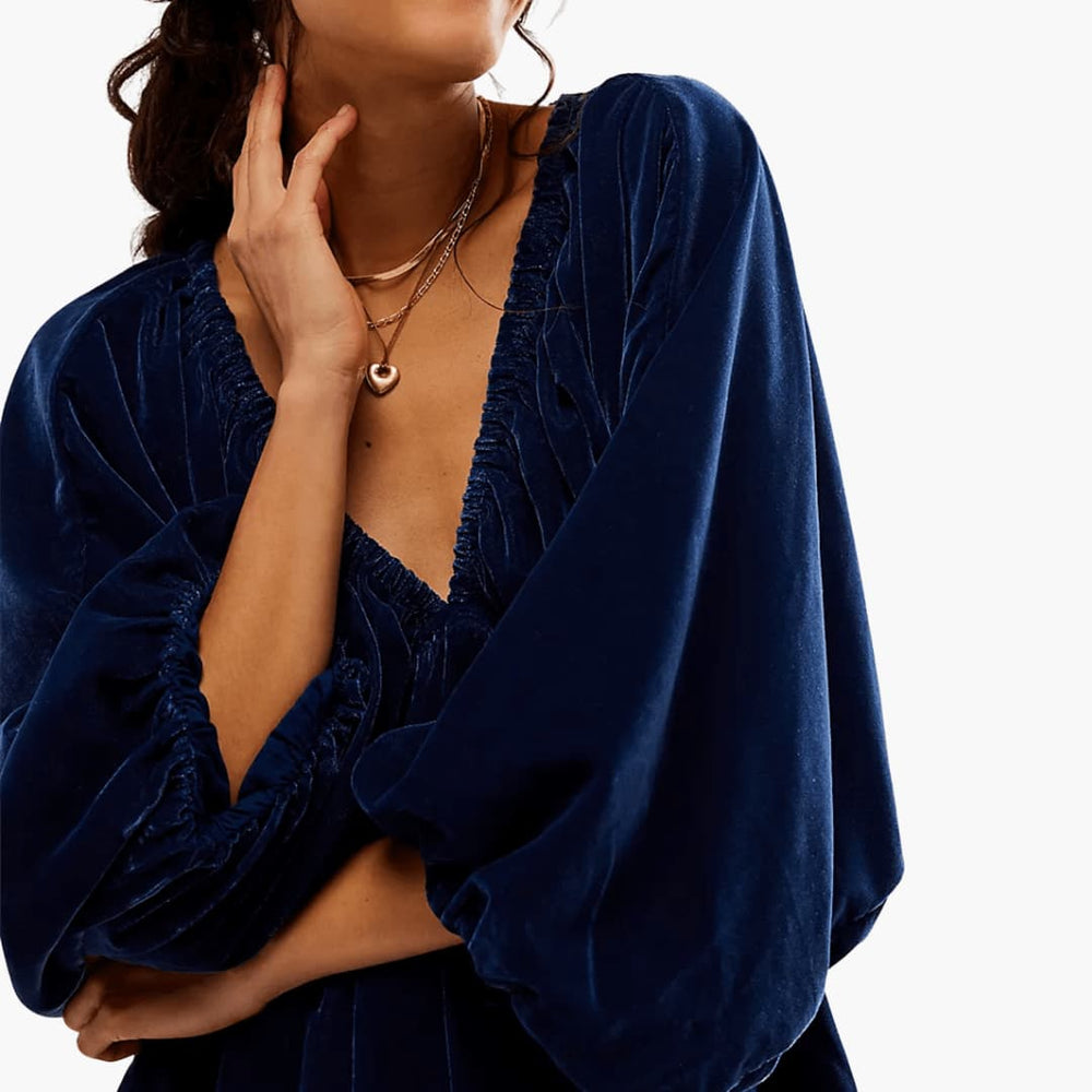 Women’s velvet mini dress with long sleeves and V-neckline