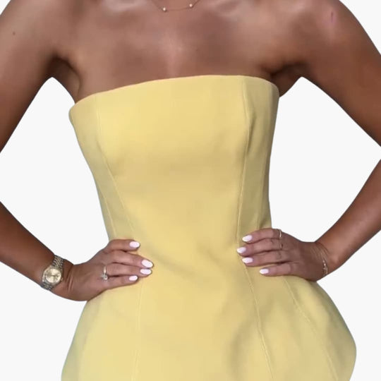 Women’s strapless maxi dress with pleated skirt and peplum bodice