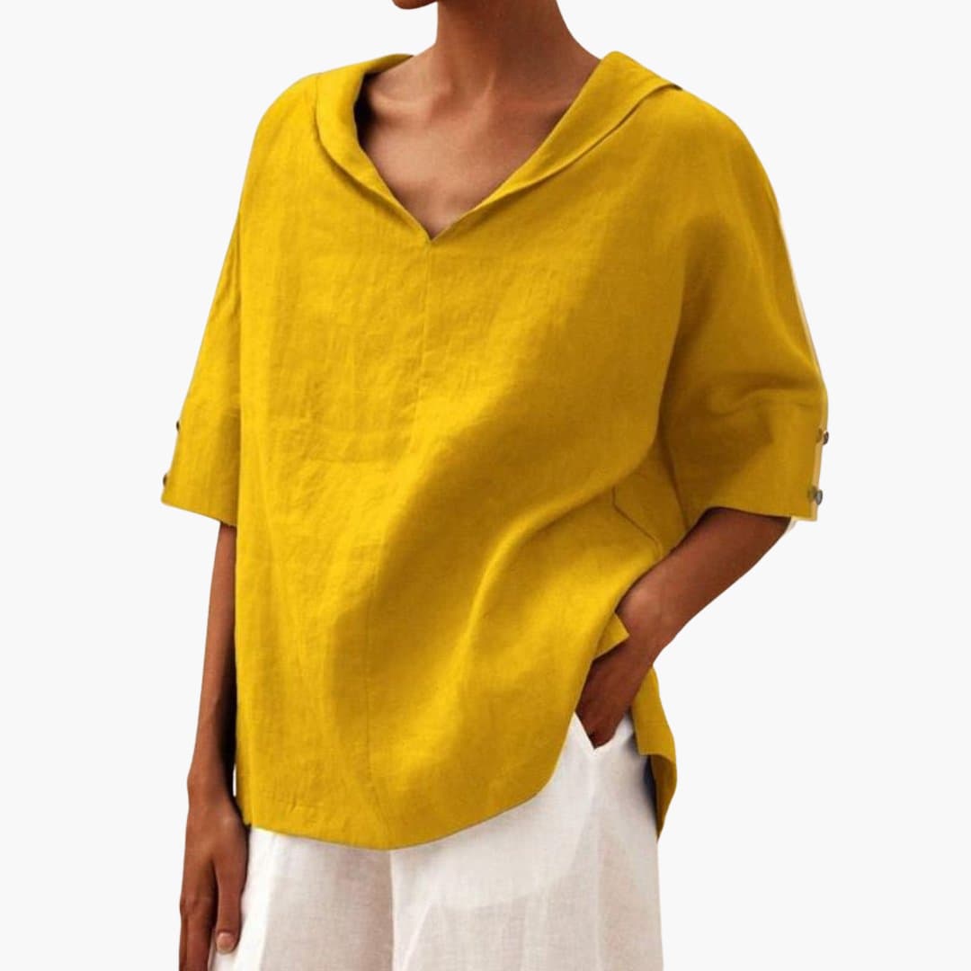 Women’s short sleeve blouse with V-neck and side slits