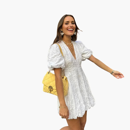Women’s summer mini dress with puff sleeves and round neckline