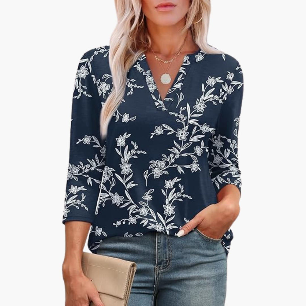 Women’s tunic top with 3/4 sleeves and curved hem