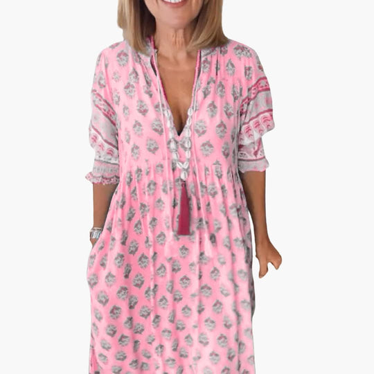 Women’s summer dress with V-neck and all-over print