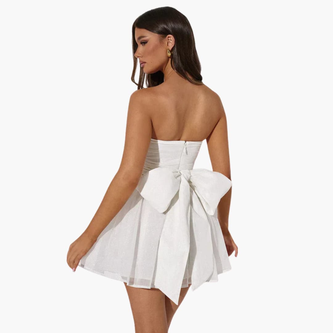 Women’s strapless mini dress with sequins and back bow detail