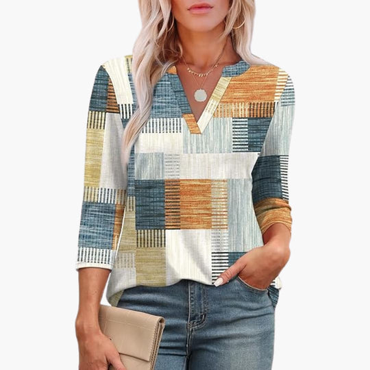 Women’s tunic top with 3/4 sleeves and curved hem